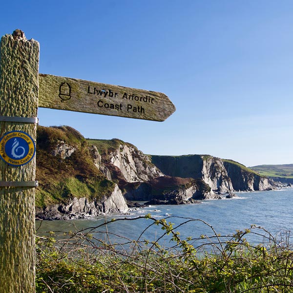 The coastal path sign at Pwllgwaelod